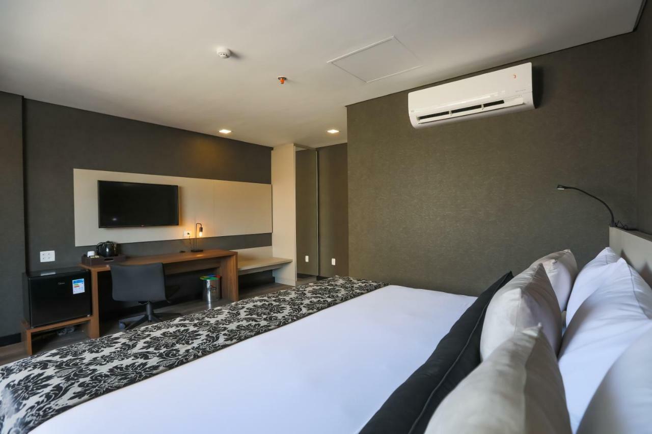 Ramada Hotel & Suites Озаску Экстерьер фото